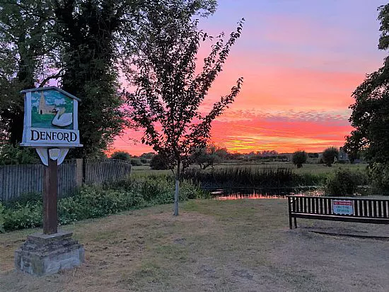 Denford Village Sign at sunset